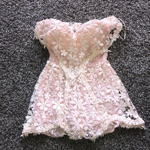 Pink crotchet floral romper size SMALL